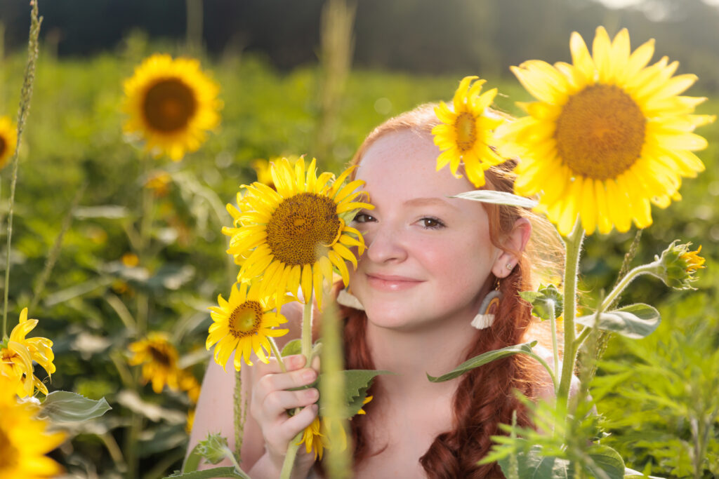 Fuquay Varina Senior in the sunflowers.