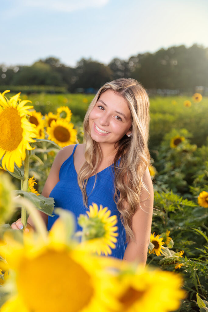 Dunn Senior Portraits in the sunflowers.