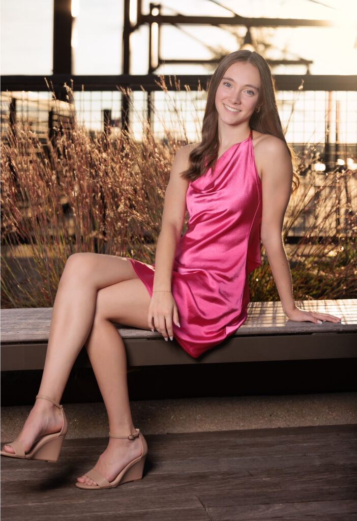 Golden Hour on Raleigh Rooftop dressed in pink for teen portraits.