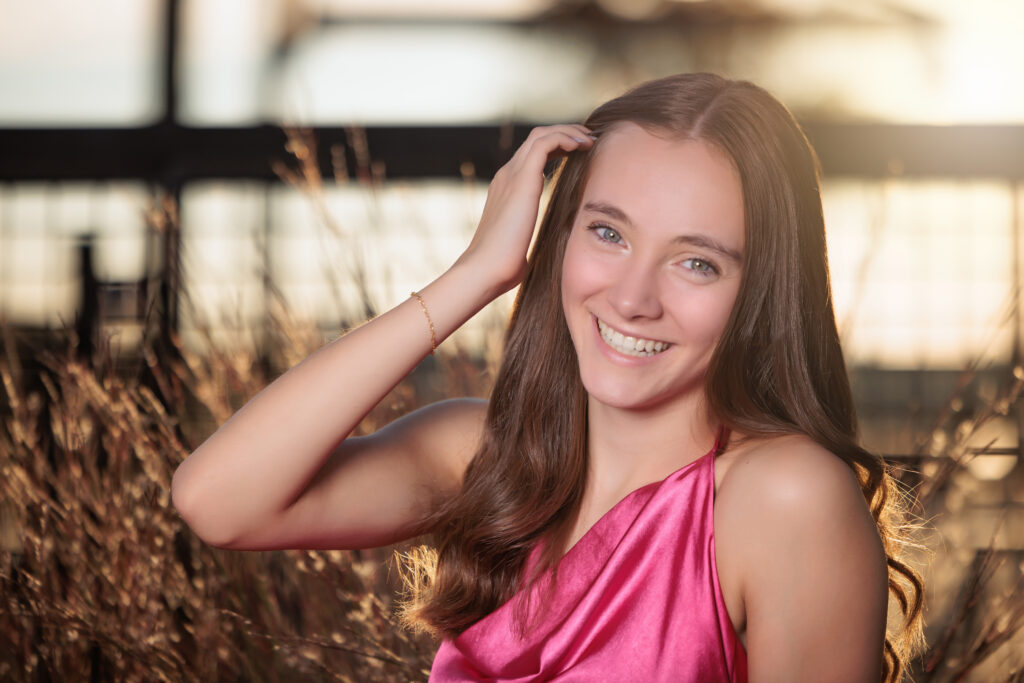 Gorgeous Teen Portraits at sunset on rooftop in downtown Raleigh