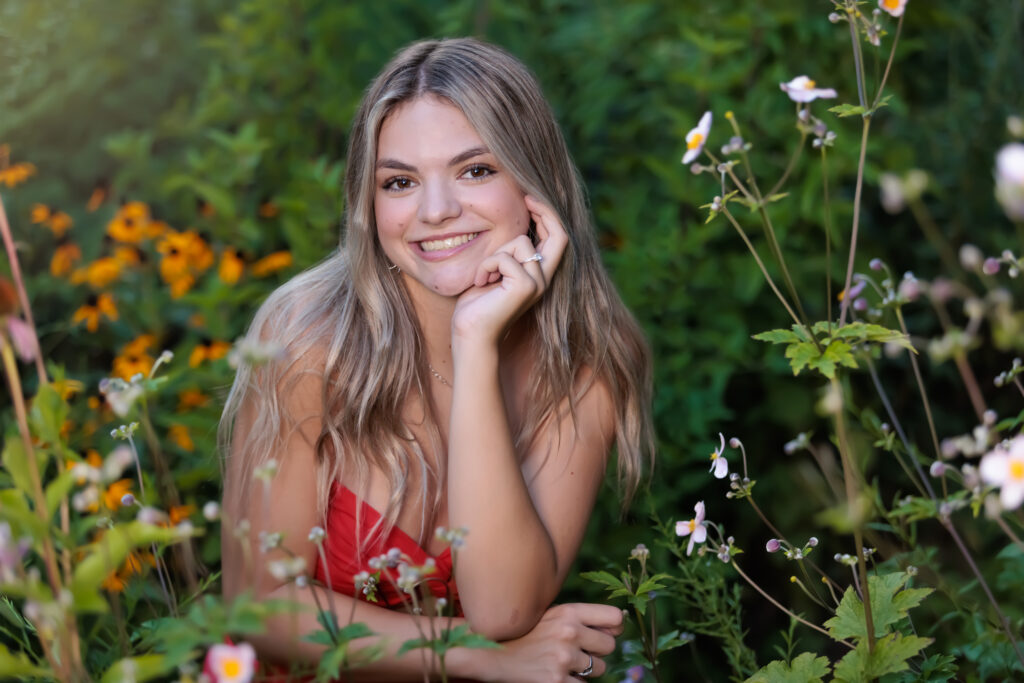 Sitting Pretty in the flowers in Durham for this FVHS senior