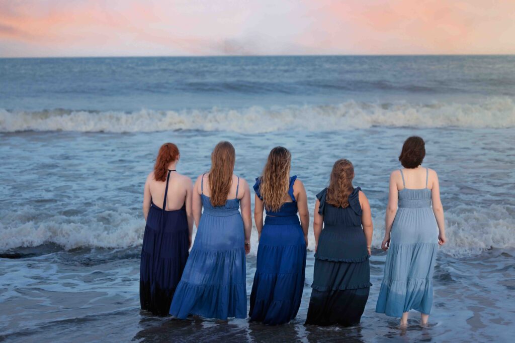 Raleigh Senior Model Team watching the sunset at Carolina Beach