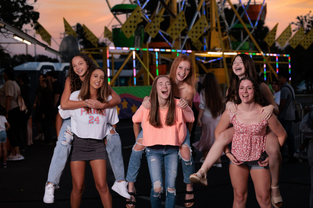 Fun at the Raleigh Carnival - Team portraits - laughing and having fun