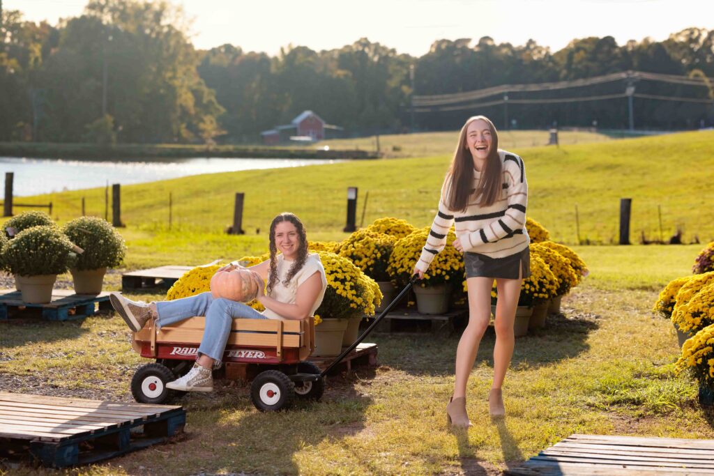 Raleigh Senior Pumpkin Patch Fall Portraits shopping for mums