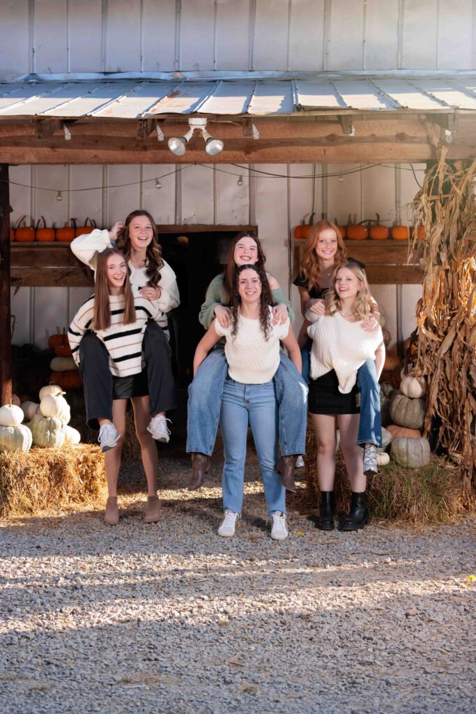 Raleigh Senior Pumpkin Patch Fall Portraits Team fun