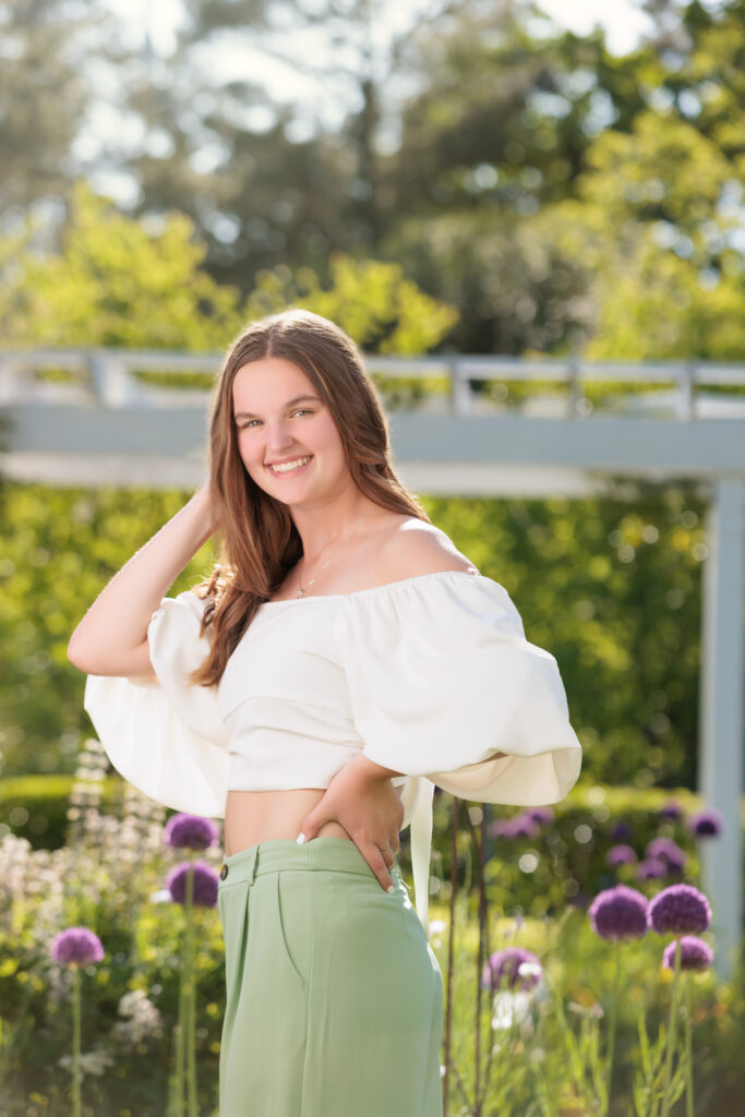 Raleigh Senior Photographer Spring Portraits Purple flowers